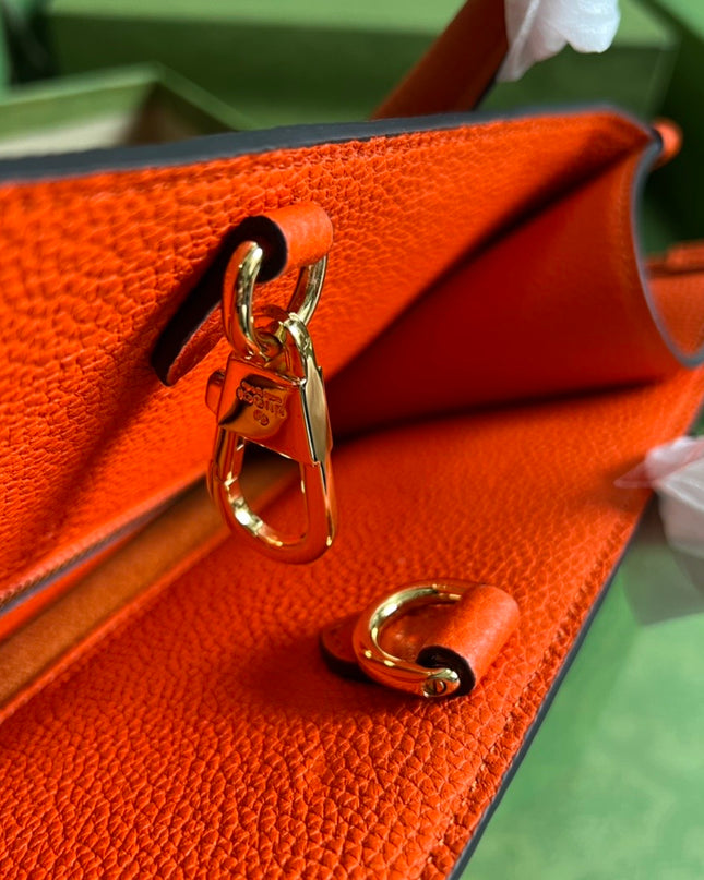 Gucci Embossed Logo Orange Leather Tote Bag 674822