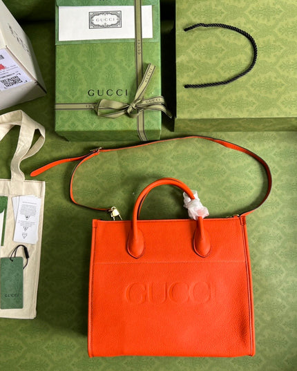 Gucci Embossed Logo Orange Leather Tote Bag 674822