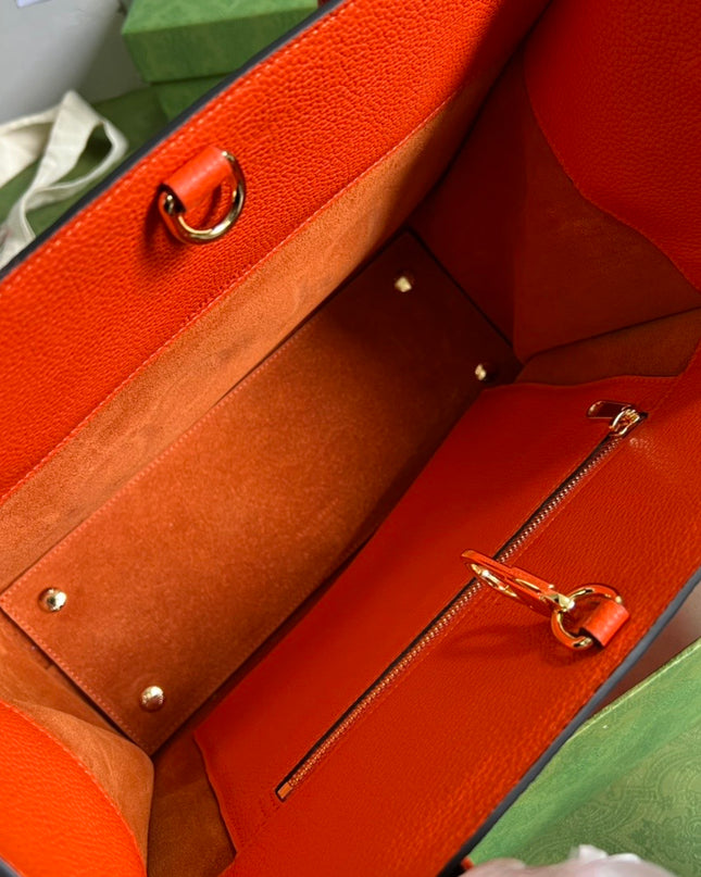 Gucci Embossed Logo Orange Leather Tote Bag 674822