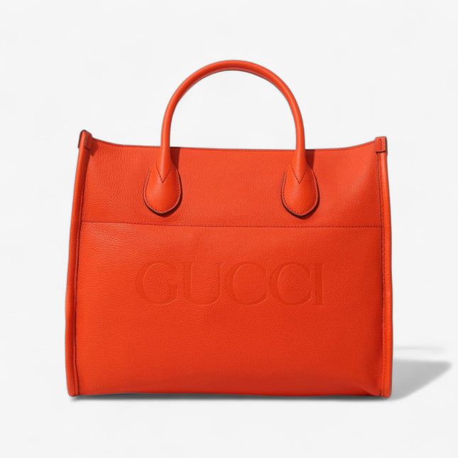 Gucci Embossed Logo Orange Leather Tote Bag 674822