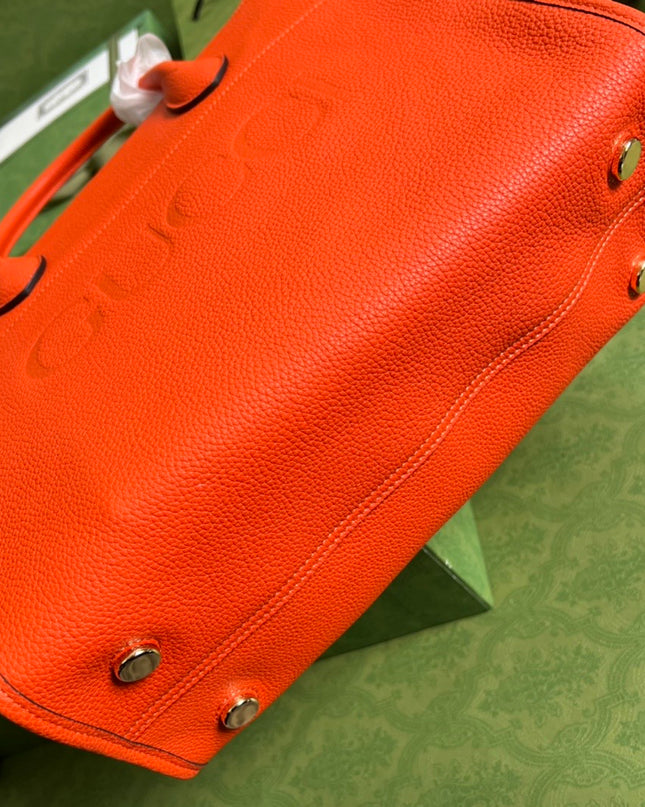 Gucci Embossed Logo Orange Leather Tote Bag 674822