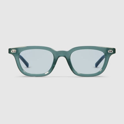 GUCCI GG1946S Oval Sunglasses – Opal Blue with Transition Lenses