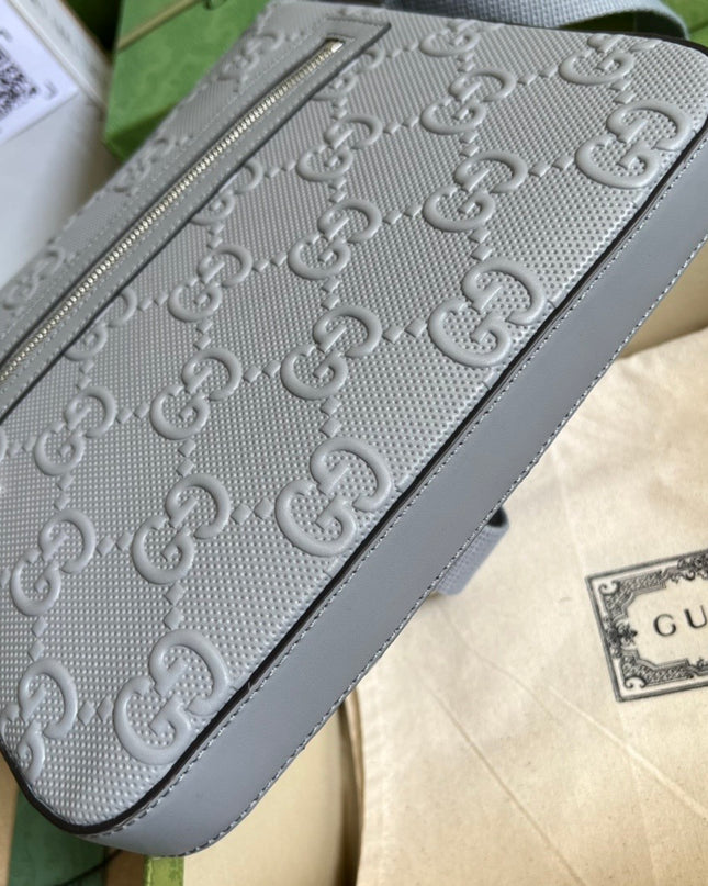 Gucci GG Embossed Leather Messenger Bag – Gray