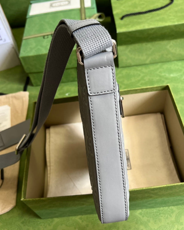 Gucci GG Embossed Leather Messenger Bag – Gray