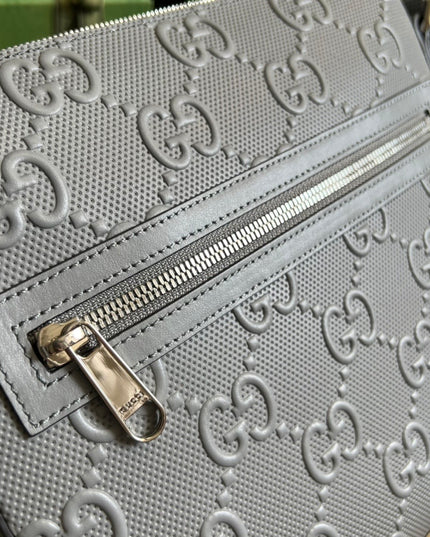 Gucci GG Embossed Leather Messenger Bag – Gray