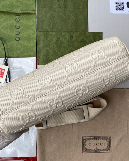 Gucci GG Embossed Leather Messenger Bag –  Beige