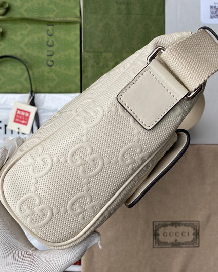 Gucci GG Embossed Leather Messenger Bag –  Beige