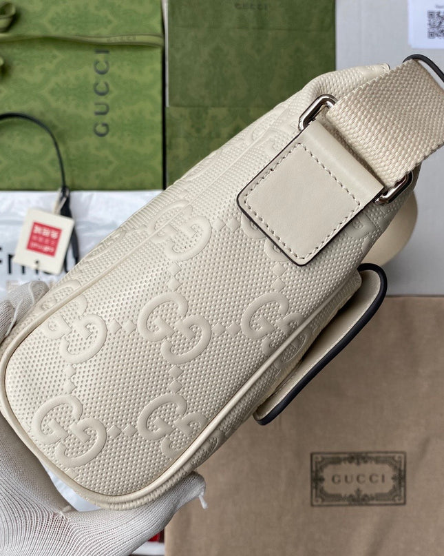 Gucci GG Embossed Leather Messenger Bag –  Beige