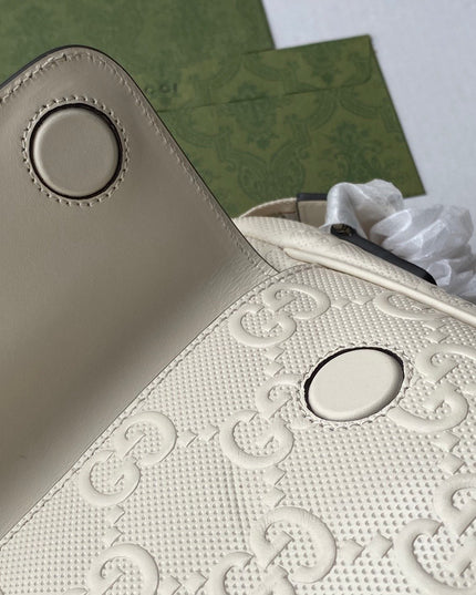Gucci GG Embossed Leather Messenger Bag –  Beige