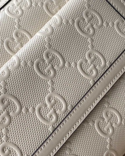 Gucci GG Embossed Leather Messenger Bag –  Beige