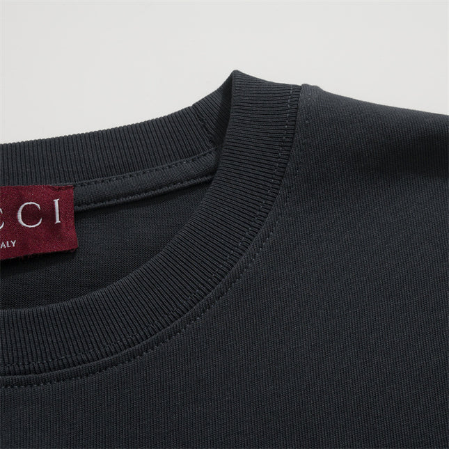 Gucci Embroidered Logo Cotton‑Jersey T‑Shirt in Black