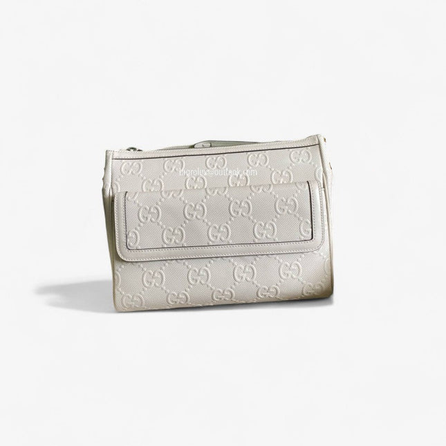 Gucci GG Embossed Leather Messenger Bag –  Beige