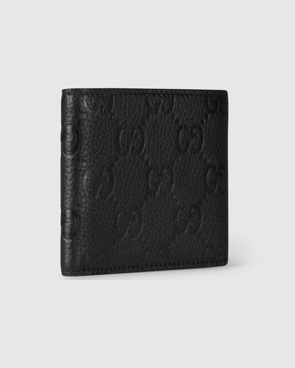 Gucci Imprint Black Embossed Leather Bi-Fold Wallet