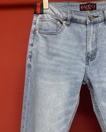 Gucci Light Wash Jeans with GG Cuff & Web Detail