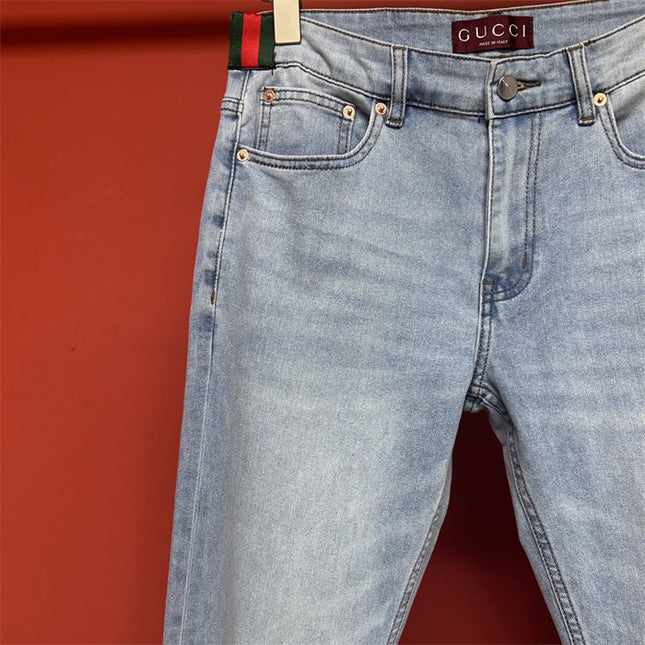 Gucci Light Wash Jeans with GG Cuff & Web Detail