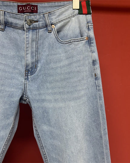 Gucci Light Wash Jeans with GG Cuff & Web Detail
