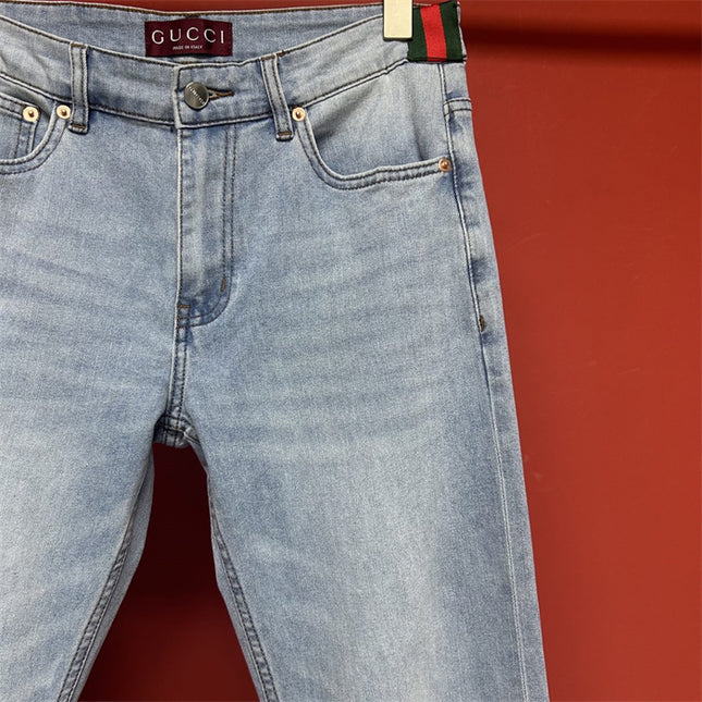 Gucci Light Wash Jeans with GG Cuff & Web Detail