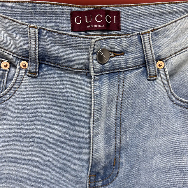 Gucci Light Wash Jeans with GG Cuff & Web Detail