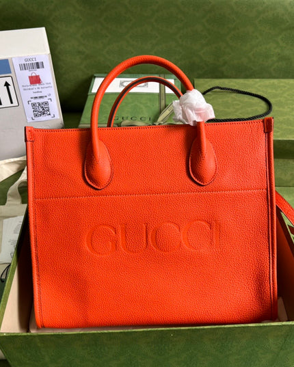 Gucci Embossed Logo Orange Leather Tote Bag 674822