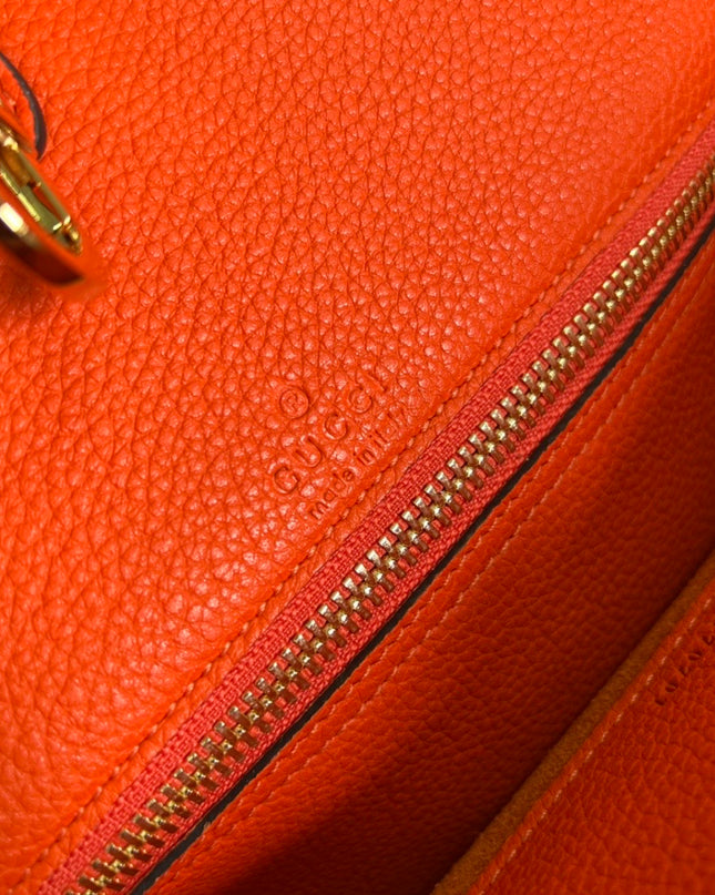 Gucci Embossed Logo Orange Leather Tote Bag 674822